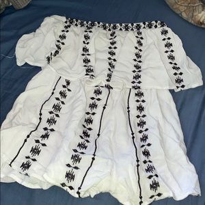 White romper with navy blue pattern